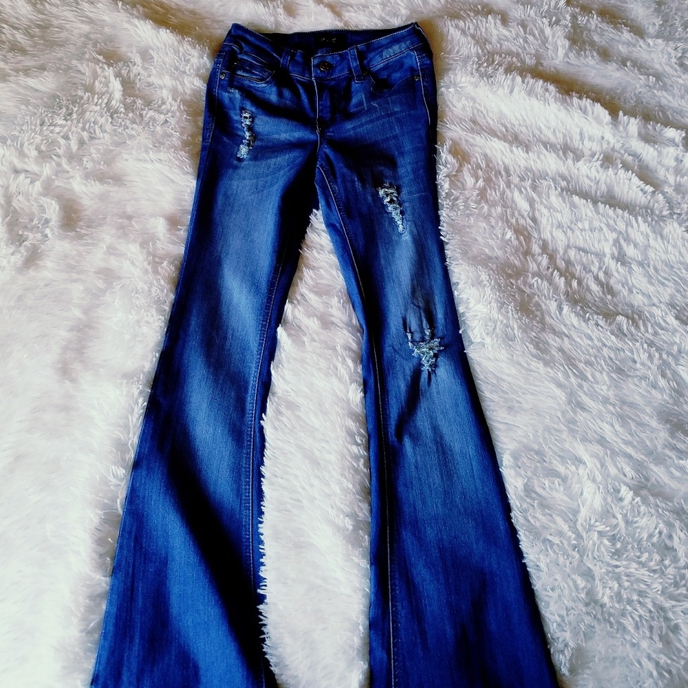 High waisted flared ripped jeans